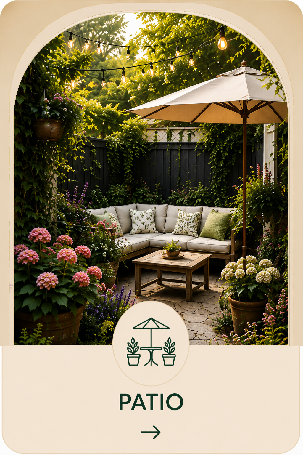 Small garden patio surrounded by lush plants and colorful flowers with a cushioned sofa, coffee table, umbrella, and string lights.